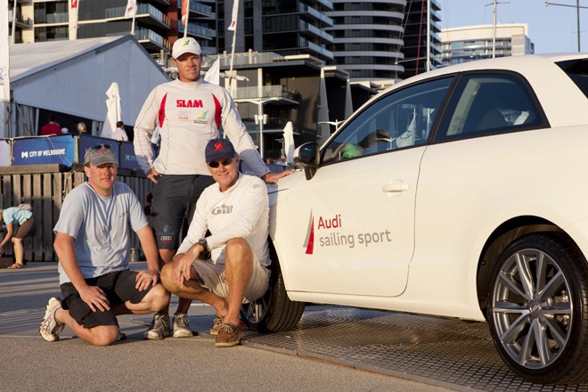 Audi King of the Docklands winning crew, Nathan Outteridge (standing), David Cheyne (left) and Ian Brown with the Audi A1 - Audi Victoria Week ©  Andrea Francolini / Audi http://www.afrancolini.com
